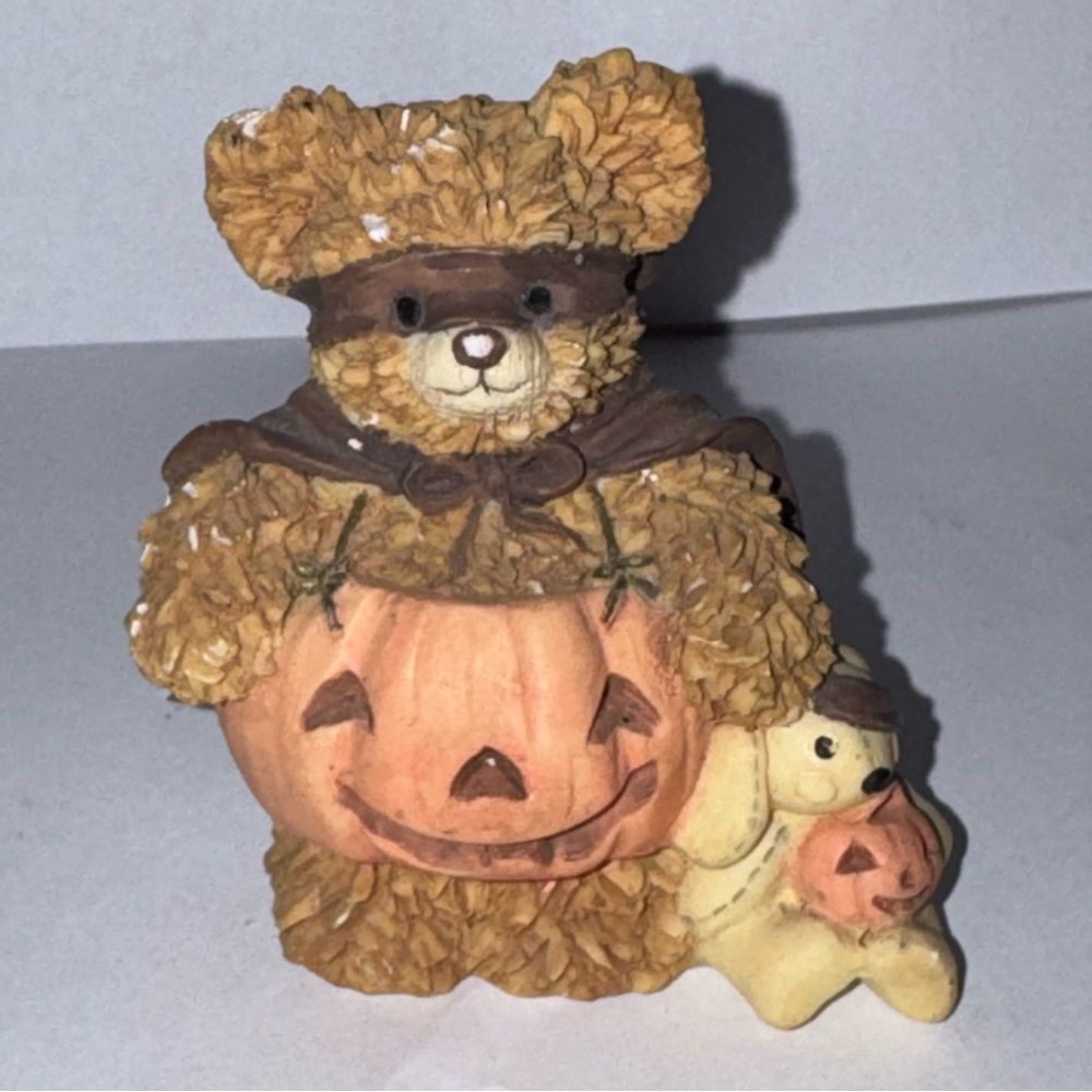 Trick-or-treating bear figurine